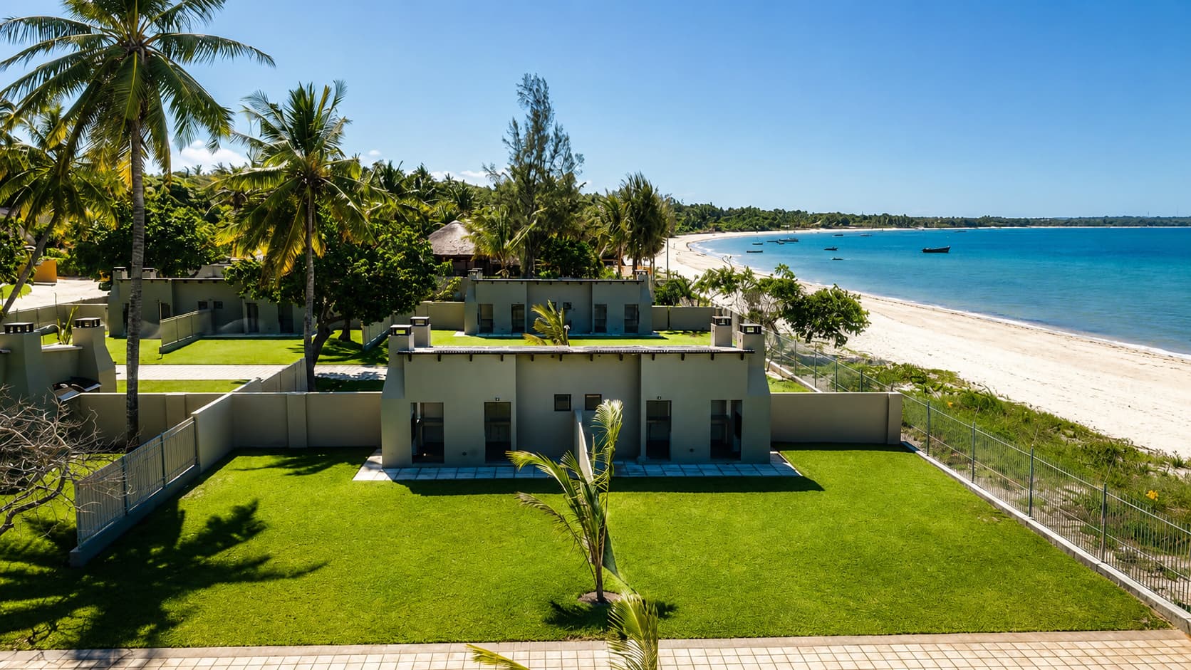 Aerial view of Beachfront stands on grass with the ocean directly behind