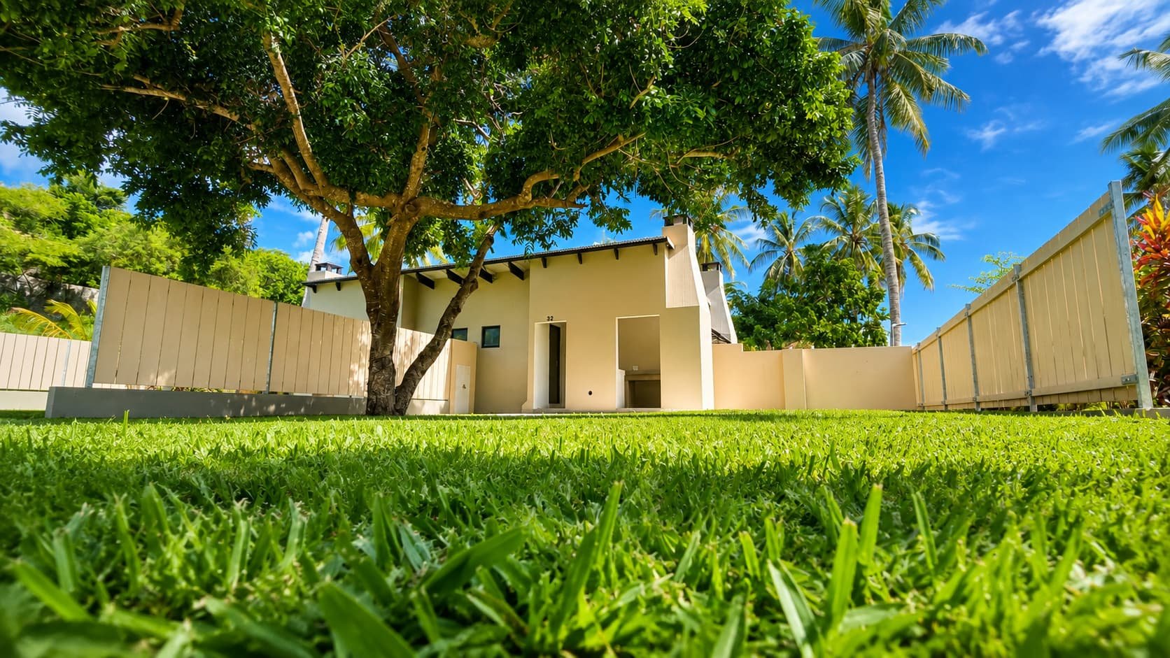 Shaded lawn beside a Standard stand