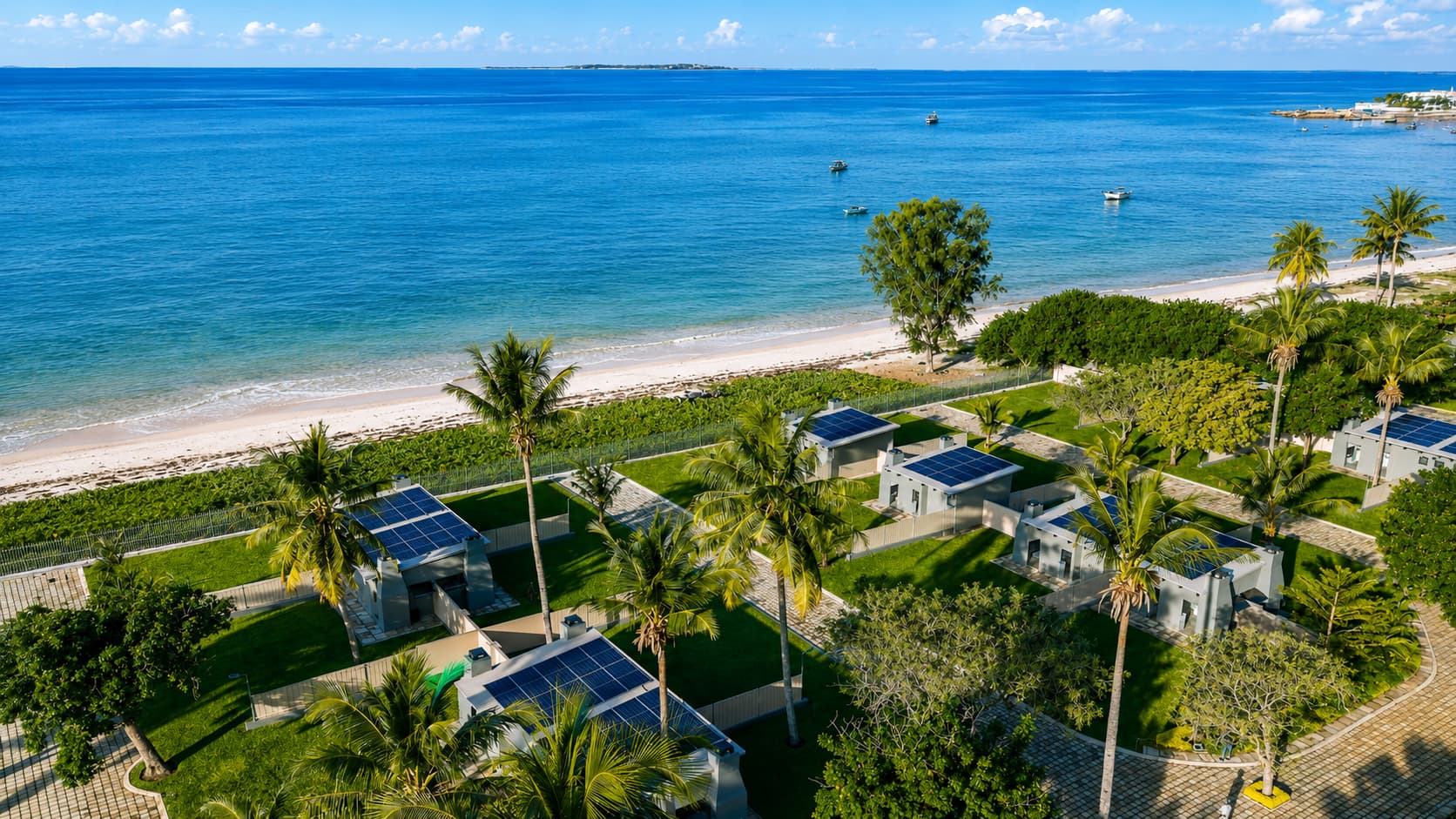 Aerial view of the beachfront stands with solar panels and the ocean beyond